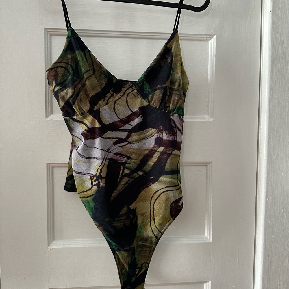 Never worn Pretty Little thing body suit